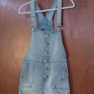 Denim overalls.